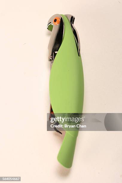 Corkscrew from Italian designer Alessandro Mendini for Alessi. Shaped like a parrot, the pocketsized wine opener comes in three colors  blue,...