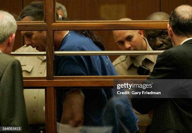 Henry Reid and Ernest Nelson speak to their lawyers in Division 30 of Los Angeles Criminal Courts on Friday, 3/7/2007 where they pleaded not guilty...