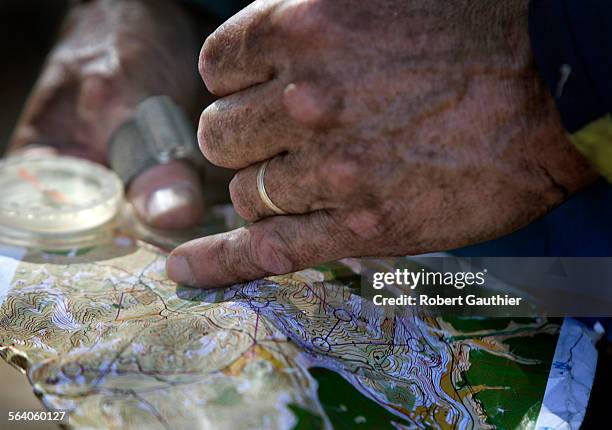 Using only a map and a compass, competitors race against time to find control stations hidden in the wilderness at the Firestone Scout Reservation in...