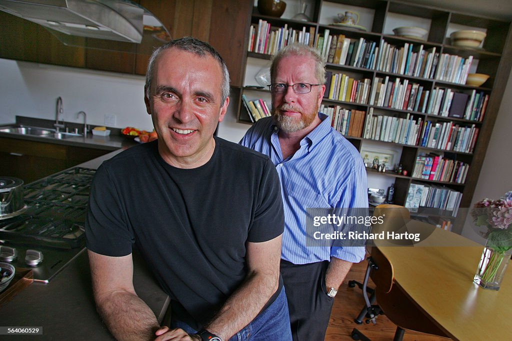 Jason La Padura, left, and Gary Murphy in the kitchen of their home Friday in Santa Monica July 28,