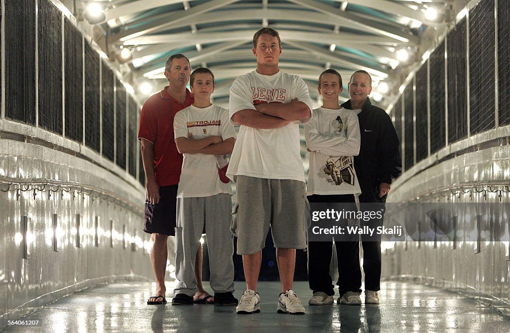 USC football player Colin Ashton, center, with his family from left, father Mark, brother Taylor, b
