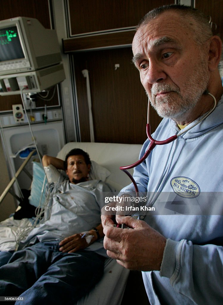 Blythe, October 27.  Dr. David Brooks(Cq), right, with a patient Francisco Quiroz (Cq), 51, who g