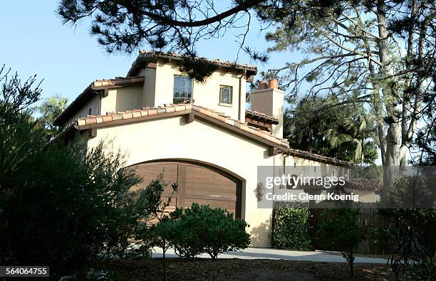 This home on Avenida Primavera in Del Mar has a large Torrey Pine Tree located in the front yard. This photo is for the Neighborly Advice column on...