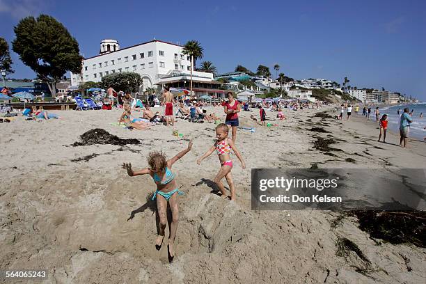   Caitlyn Guthrie , an environmental analysis major, on Laguna's main beach making note of human activity. Caitlyn is one of several Pomona College...