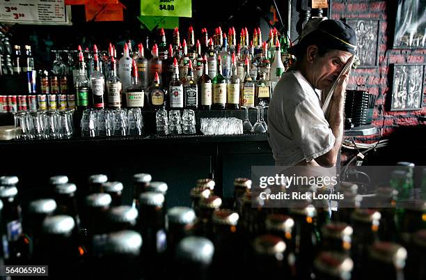 New Orleans, La.  Allan Kagan, owner of the Dungeon in the French Quarter district, battles the heat to prepare the historic bar for reopening as...