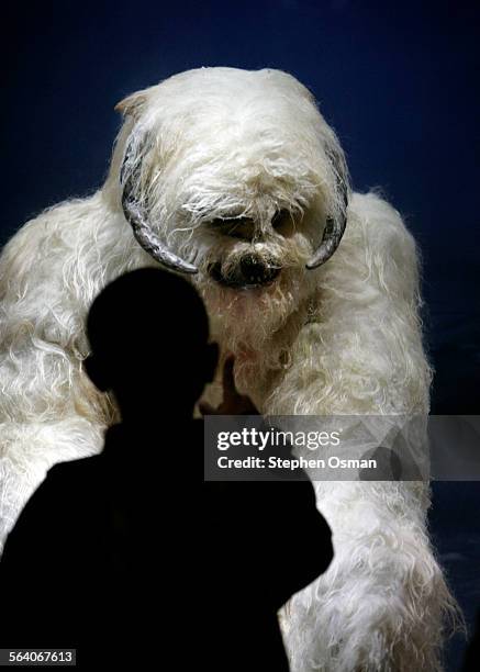 Young visitor looks at a display of a Wampa costume used in Star Wars episode V The Empire Strikes Back. The California Science Center has a Star...