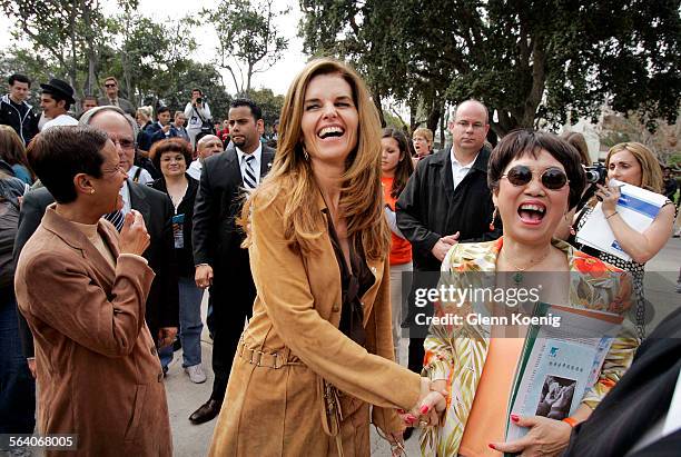 Maria Shriver, the wife of Gov. Arnold Schwarzenegger, is the center of attention at Santa Ana Collge Wednesday.Shriver was on hand to launch a...
