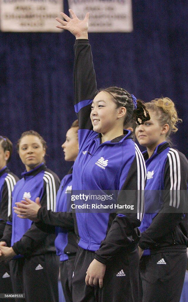 Anna Li Ucla UCLA gymnast Anna Li waves during introductions before the Bruin's ...