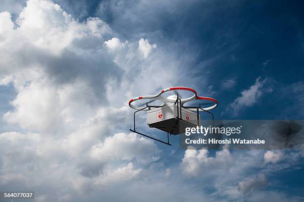 ambulance drone carries aed - drone technology stock pictures, royalty-free photos & images