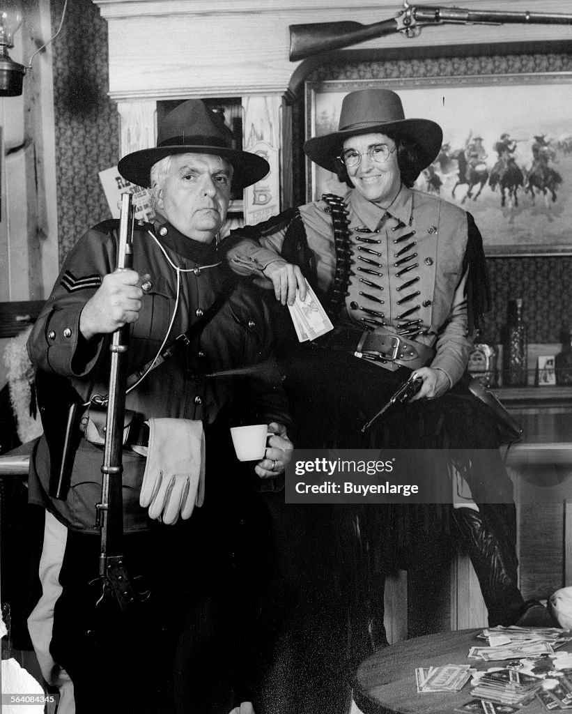 Photographer Carol M. Highsmith and her husband Ted Landphair dressed is costume for a Christmas car