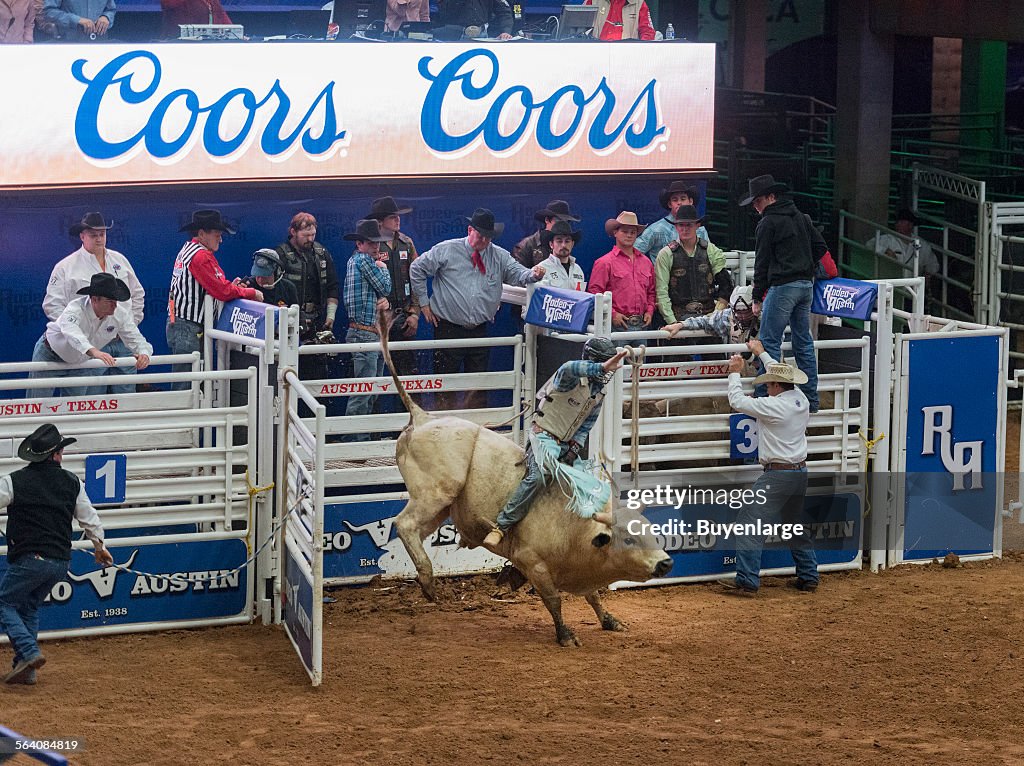 Bull riding at Rodeo Austin, the city annual stock show and rodeo. Austin, Texas