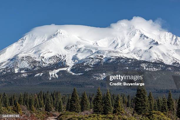 Distant views of looming Mount Shasta, located at the southern end of the Cascade Range in Siskiyou County, California