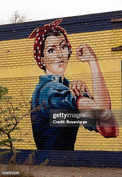 Rosie the Riveter mural on an abandoned building in Sacramento, California