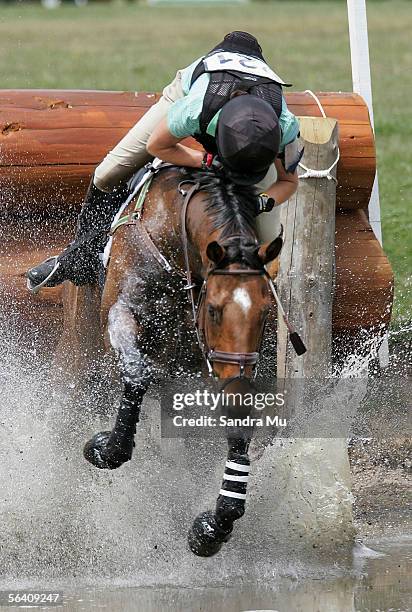 Thea Sweeney riding Dunstan Funky stumbles as she jumps the water hurdle during the cross country event at the Puhinui Three Day Event at the Puhinui...