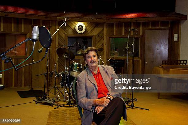 Rick Hall, founder of FAME Recording Studios, sitting in the FAME studio in Muscle Shoals, Alabama