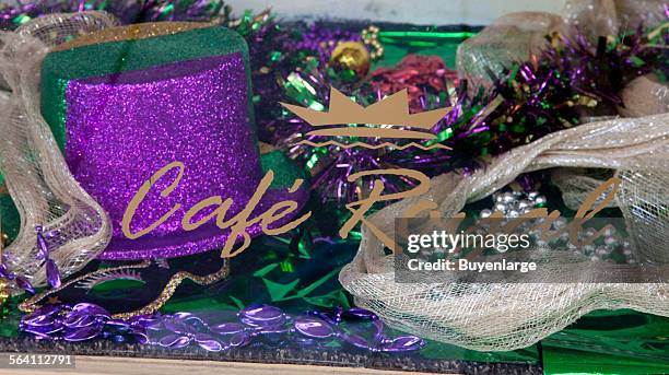 Mardi Gras displays and details in store windows during the Mardi Gras season in Mobile, Alabama