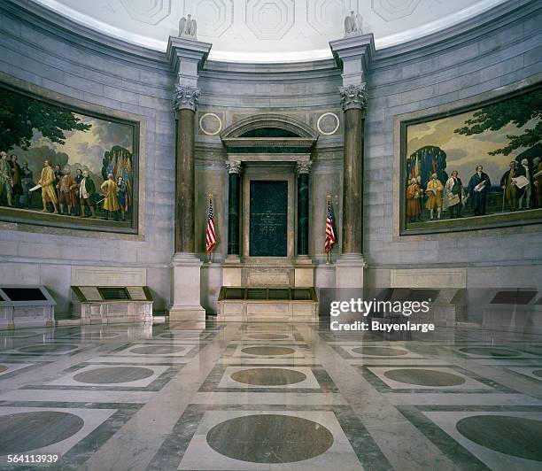 The dimly lit hall at the National Archive where the Charters of Freedom, the U.S. Constitution and Declaration of Independence, are displayed....