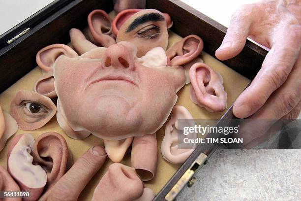 Ashburn, UNITED STATES: TO GO WITH AFP STORY: US-COSMETIC-HEALTH-ESPIONAGE Former CIA master of the disguise Bob Barron shows some of his prosthetic...