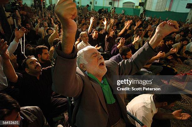 Wheelchair-bound devotee prays for healing at the Jamkaran Mosque December 6, 2005 in Jamkaran, Iran. Some Iranian Shiites believe and are waiting...