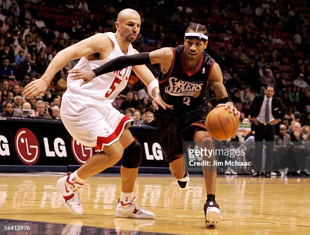 Allen Iverson of the Philadelphia 76ers drives past Jason Kidd of the New Jersey Nets during their game at Continental Airlines Arena on December 10,...