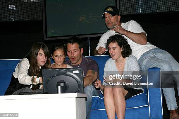 Scout Willis, Tallulah Willis, Johnny Messner, Rumer Willis and Bruce Willis are seen onstage during Playstation BANDtogether, a benefit presented by...