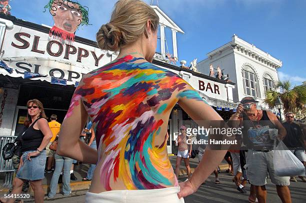 In this handout photo, Lizzy Lynn of Tavernier, Florida, is photographed outside Sloppy Joe's Bar on Duval Street during the Fantasy Fest Parade...
