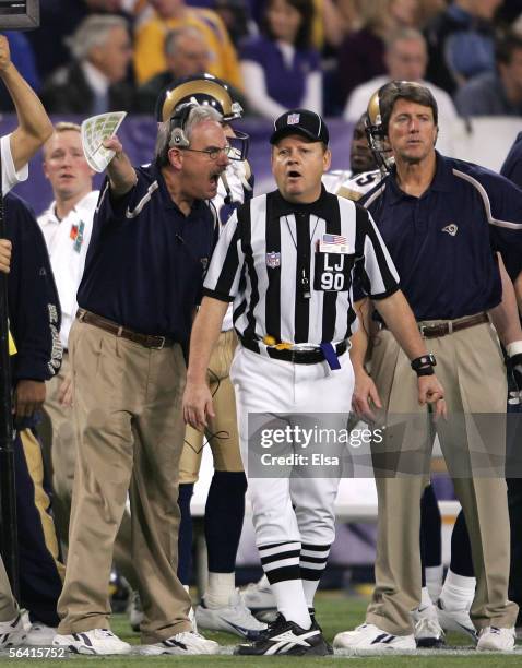 Interim head coach Joe Vitt argues a call with Mike Spanier after Vitt thought that his player Torry Holt was roughed up enough to get a penalty on...