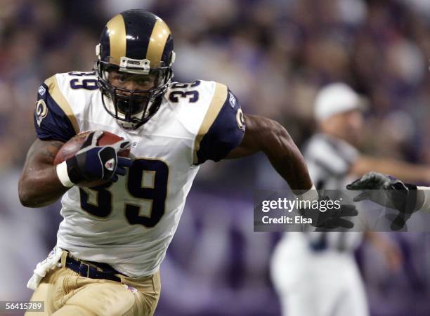 Steven Jackson of the St. Louis Rams carries the ball in the first half against the St. Louis Rams on December 11, 2005 at the Hubert H. Humphrey...