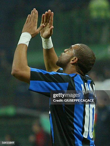 Inter Milan's forward Adriano of Brazil celebrates after scoring a penalty against AC Milan during their italian serie A football match at San Siro...