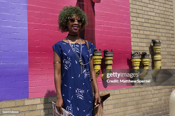 Shayna Goncalves is seen attending the Nick Graham, Kenneth Ning & John Elliott presentations wearing a vintage dress and glasses, Zara shoes, and...