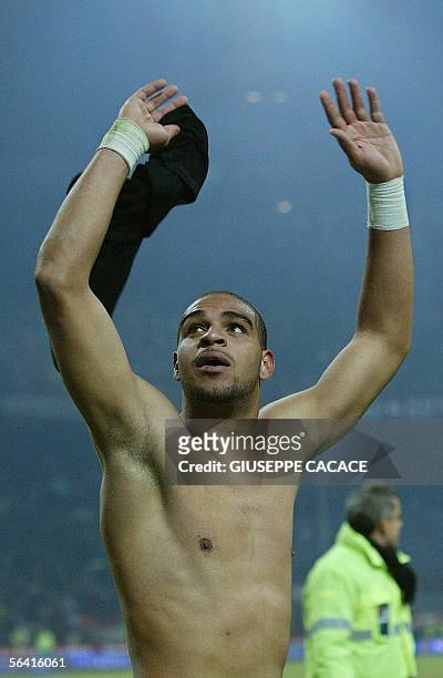 Inter Milan's forward Adriano of Brazil celebrates after his team won against AC Milan during their italian serie A football match at San Siro...