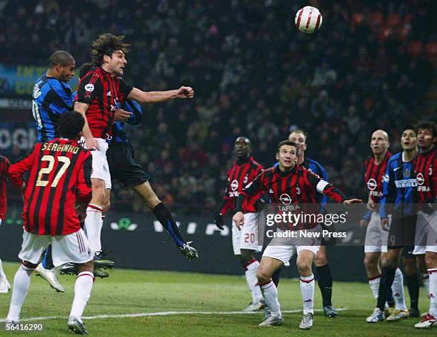 Adriano of Inter heads his injury time winner during the Serie A match between Inter Milan and AC Milan played at the Giuseppe Meazza San Siro...