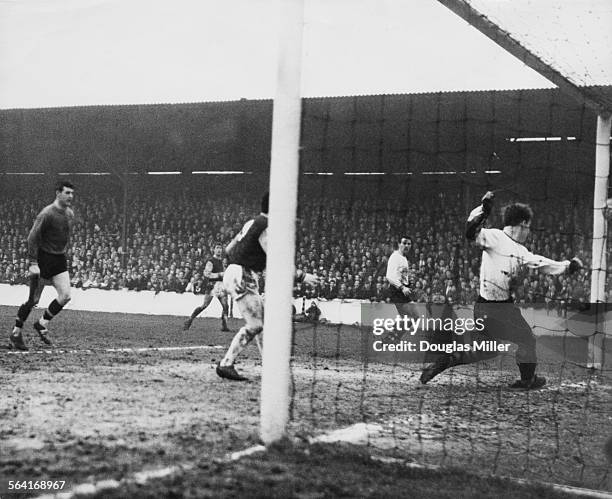 Burnley defender Alex Elder puts the ball in his own net, while attempting to clear a shot from West Ham's John Sissons, scoring West Ham's first...