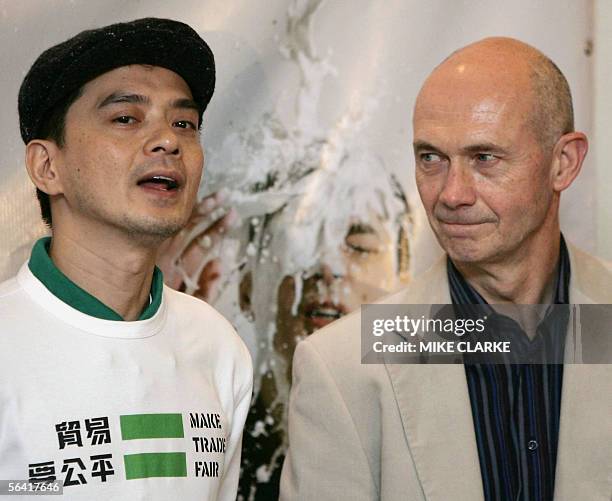 Chinese singer Anthony Wong addresses the press before presenting a petition on behalf of Oxfam to WTO Director General Pascal Lamy at the venue of...