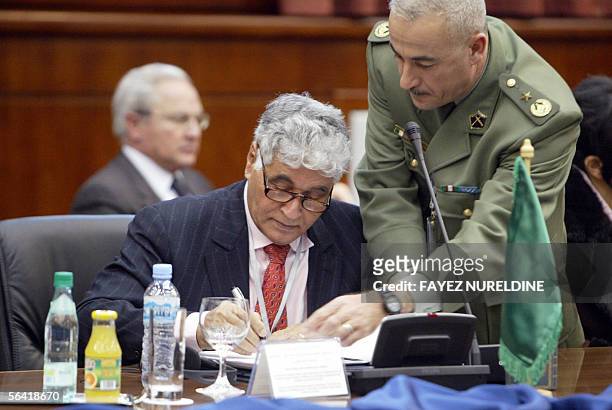 Lybia's Defence minister General Major Ahmed Mahmoud Ali Ezzawi signs the final statement of the "Five-plus-five meeting of the ministers of Defence"...