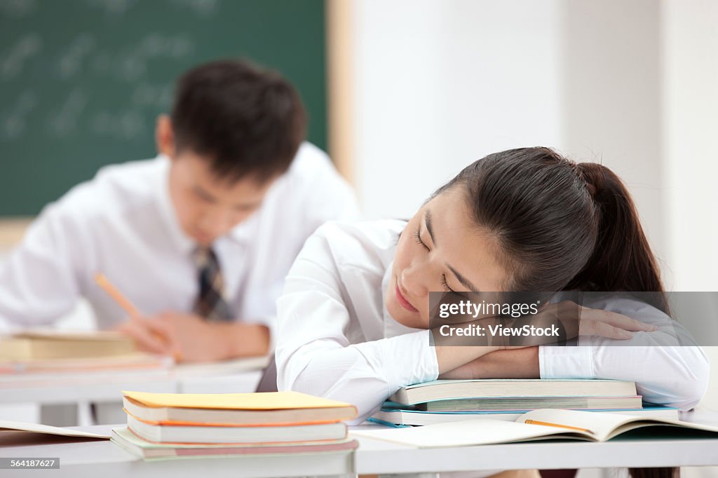 Well Rested Students In Class High School Students Rest On The Desk In The Classroom High-Res Stock ...