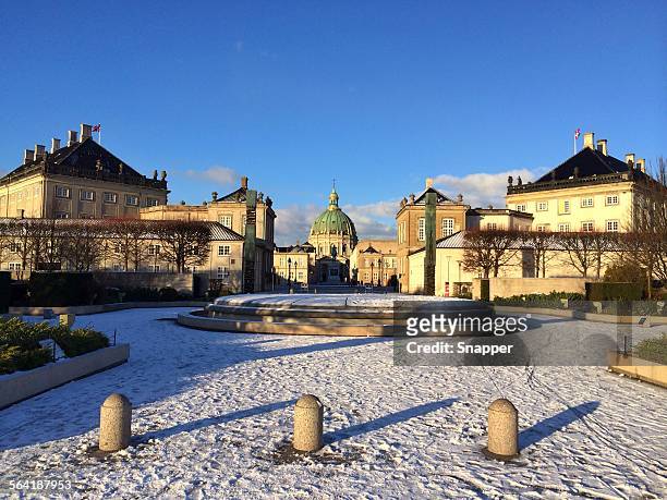 amalienborg palace in winter, copenhagen, denmark - amalienborg palace stock pictures, royalty-free photos & images