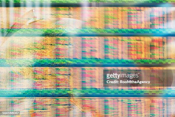 ticker tape stock market financial data moving quickly on screen - fita de telimpressor - fotografias e filmes do acervo