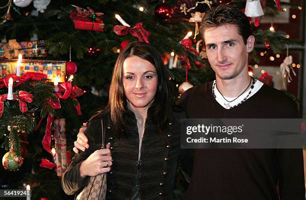 Miroslav Klose and his wife attend the Annual Christmas Party of Werder Bremen on December 12, 2005 at the Park Hotel in Bremen, Germany.