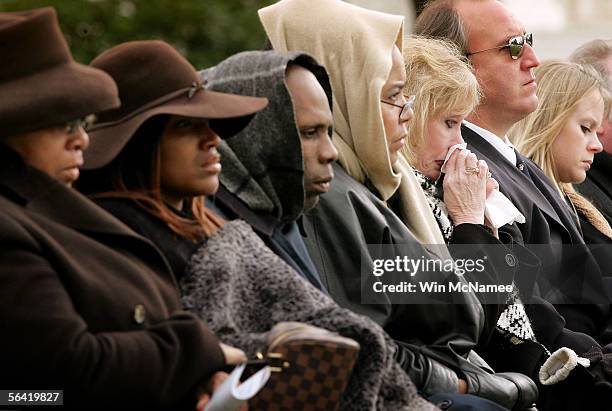 Family members take part in a remembrance ceremony on the 20th anniversary of the Gander, Newfoundland air disaster at Arlington National Cemetery...