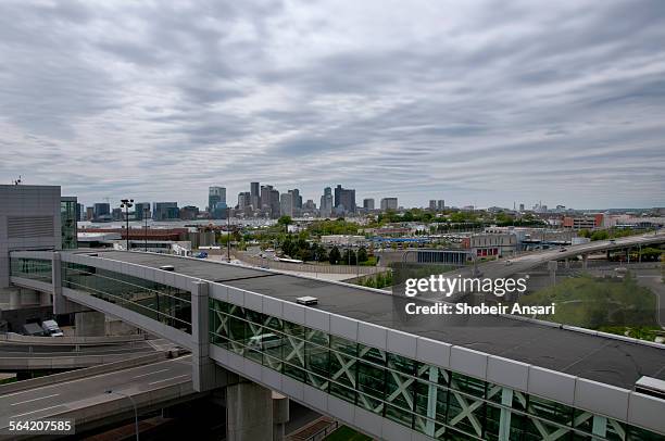 boston skyline from distance - boston logan international airport stock pictures, royalty-free photos & images