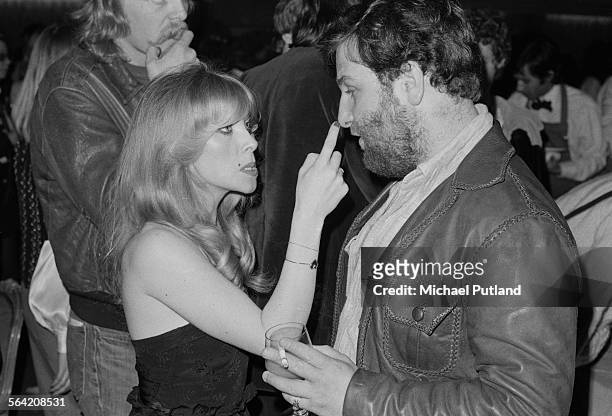 English singer-songwriter Lynsey de Paul with English concert promoter Harvey Goldsmith, at a party given by American rock group The Eagles, 26th...