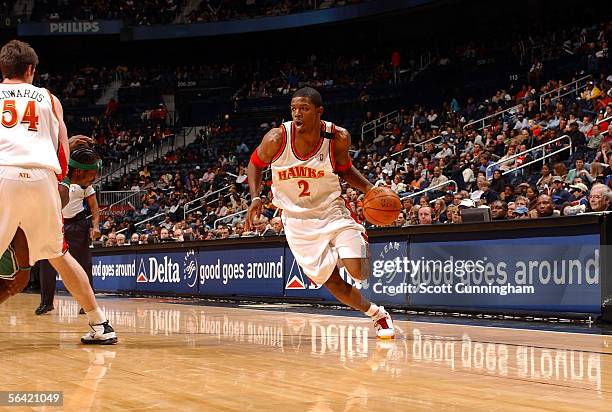 Joe Johnson of the Atlanta Hawks drives to the basket during the game against the Boston Celtics at Philips Arena on November 23, 2005 in Atlanta,...