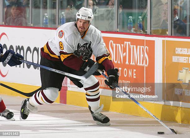 Kip Miller of the Chicago Wolves controls the puck during the game against the Milwaukee Admirals at Allstate Arena on November 19, 2005 in Rosemont,...