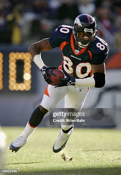 Wide receiver Rod Smith of the Denver Broncos carries the ball against the Baltimore Ravens during the game on December 11, 2005 at Invesco Field at...