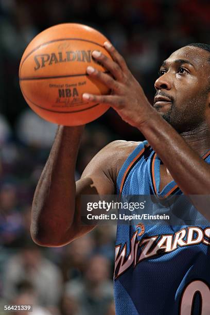 Gilbert Arenas of the Washington Wizards shoots a free throw during the game with the Detroit Pistons on November 23, 2005 at the Palace of Auburn...