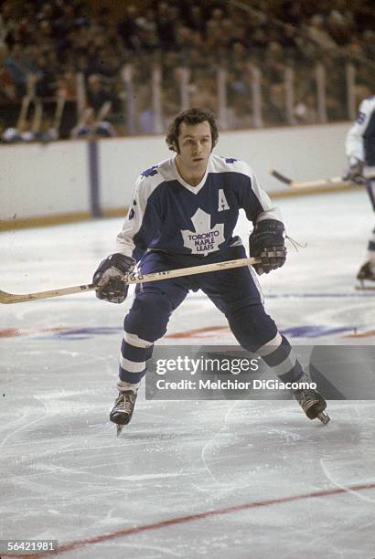 Canadian pro hockey player Ron Ellis of the Toronto Maple Leafs on the ice, 1970s.