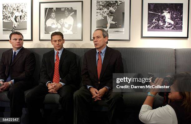 Red Sox CEO/President Larry Lucchino introduces Co-General Managers Ben Cherington and Jed Hoyer December 12, 2005 at a press conference at Fenway...