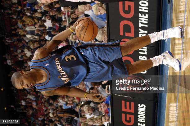 Caron Butler of the Washington Wizards looks to drive against the Orlando Magic November 23, 2005 at TD Waterhouse Centre in Orlando, Florida. The...