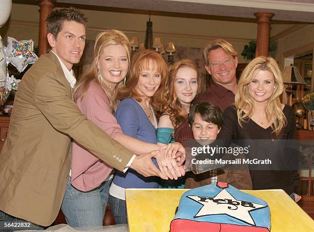 Steve Howey, Melissa Peterman, Reba McEntire, Joanna Garcia, Mitch Holeman, Christopher Rich and Scarlett Pomers from the cast of "Reba" attend a...